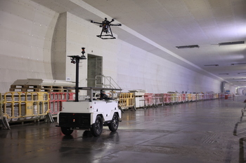 Autonomous air-ground cooperative tunnel inspector