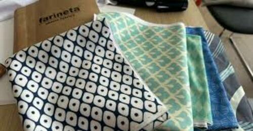 Tejidos elásticos y no elásticos enfocados para fabricantes de prendas deportivas y publicistas.